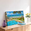Caribbean Hotel, Miami Beach, Florida 1960s - Canvas Print Painterly 1960s view of the Caribbean Hotel in Miami Beach, Florida, with an oceanfront swimming pool, diving boards, palm trees, sunbathers and the Atlantic Ocean.