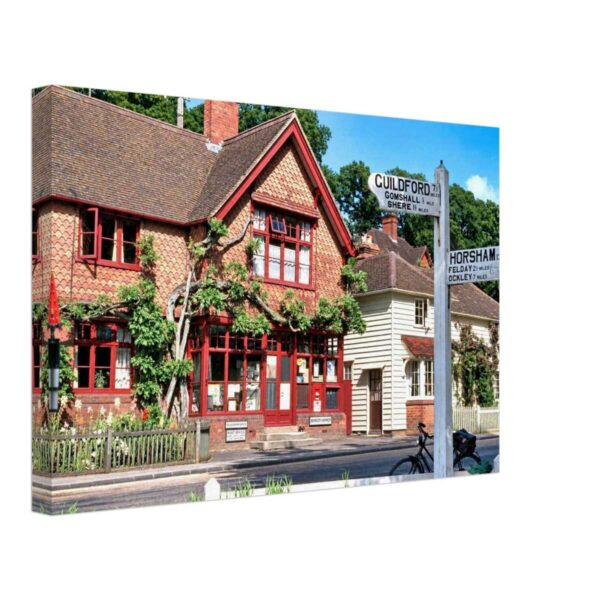 Abinger Hammer Post Office, Surrey, England 1950s - Canvas Print 1950s Abinger Hammer Post Office in Surrey, England, with its traditional fingerpost sign and picturesque village buildings, prepared in a clean photographic style from a genuine vintage color photograph.