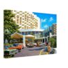 Americana Hotel, Bal Harbour, Florida 1970s - Canvas Print Americana Hotel entrance in Bal Harbour, Florida with 1970s cars, guests and modern resort architecture, 1974 - Canvas Print