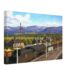 1950s painterly view of Aviemore Junction, Scotland with Black Five steam locomotive 44998, freight wagons and Cairngorm mountain scenery - canvas print.