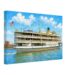 Painterly 1960s view of the Boblo boat SS Columbia on the Detroit River, with passengers, festive bunting, blue water and the Detroit shoreline in the background.
