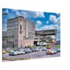 Cumbernauld Town Centre, Scotland 1970s - Canvas Print 1970s view of Cumbernauld Town Centre in Scotland, featuring the Golden Eagle Hotel, the futuristic shopping centre and a parking lot filled with classic British cars, reimagined in a painterly style from a genuine vintage color photograph.