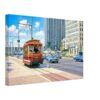 Painterly 1980s view of the Detroit Citizens Railway trolley on Jefferson Avenue, heading toward the Renaissance Center with downtown buildings, traffic and period cars.