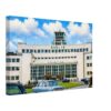 Dublin Airport, Ireland 1960s - Canvas Print 1960s view of Dublin Airport's original Art Deco terminal building in Ireland, with classic cars outside the departures entrance, reimagined in a painterly style from a genuine vintage color photograph.