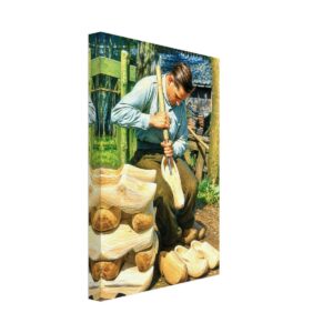 Dutch Clog Maker, Netherlands 1950s – Canvas Print Painterly 1950s view of a Dutch clog maker in the Netherlands, carving a wooden shoe by hand with finished and unfinished clogs around him.