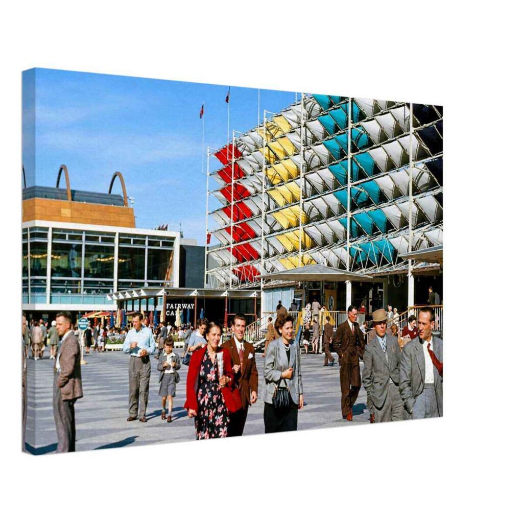 Visitors walking through the South Bank Festival of Britain site in London during 1951 beside colorful decorative panels and exhibition buildings - Canvas Print