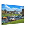 Painterly 1960s view of the Municipal Center in Flint, Michigan, with period cars in a parking lot, civic buildings, lawns and a domed modernist structure.