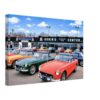 1970 view of Gorin's Sports Car Center in Vernon, Connecticut, with MG sports cars outside the dealership.