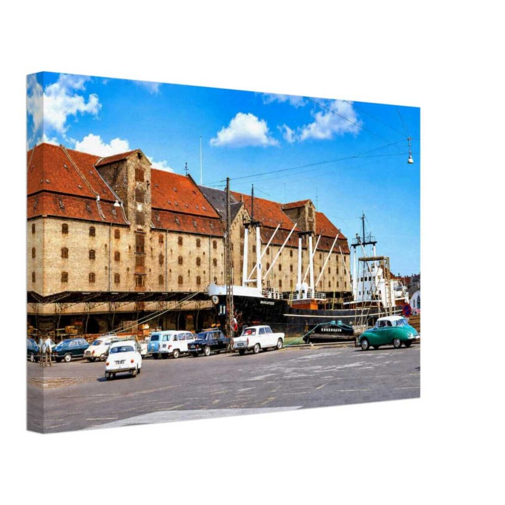 Historic Greenland Trade Warehouse on Copenhagen Harbor with the cargo ship Bakkafoss, Denmark 1968.
