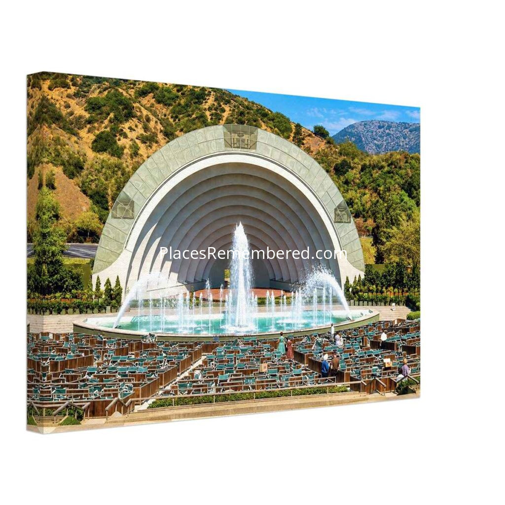 Painterly 1950s view of the Hollywood Bowl in California, with fountains in front of the amphitheater, rows of seats, visitors and hills behind the stage.
