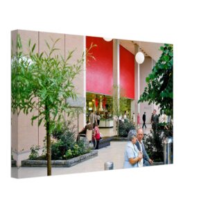 1960s interior of Macy's at Walt Whitman Mall in South Huntington, New York, featuring landscaped gardens and modern mall architecture, reimagined in a painterly style from a genuine vintage color photograph.