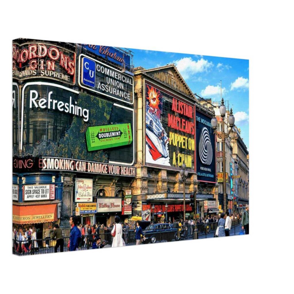Vintage 1971 view of Piccadilly Circus with the London Pavilion advertising Alistair MacLean's Puppet on a Chain.