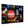 Photographic 1960s night view of Piccadilly Circus in London with Coca-Cola, Guinness, rum and Skol illuminated signs