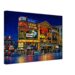 Piccadilly Circus at Night, London, England 1960s - Canvas Print Painterly 1960s night view of Piccadilly Circus in London with illuminated advertising signs, London Pavilion cinema billboards, red buses, vintage cars, crowds and reflections on wet streets.