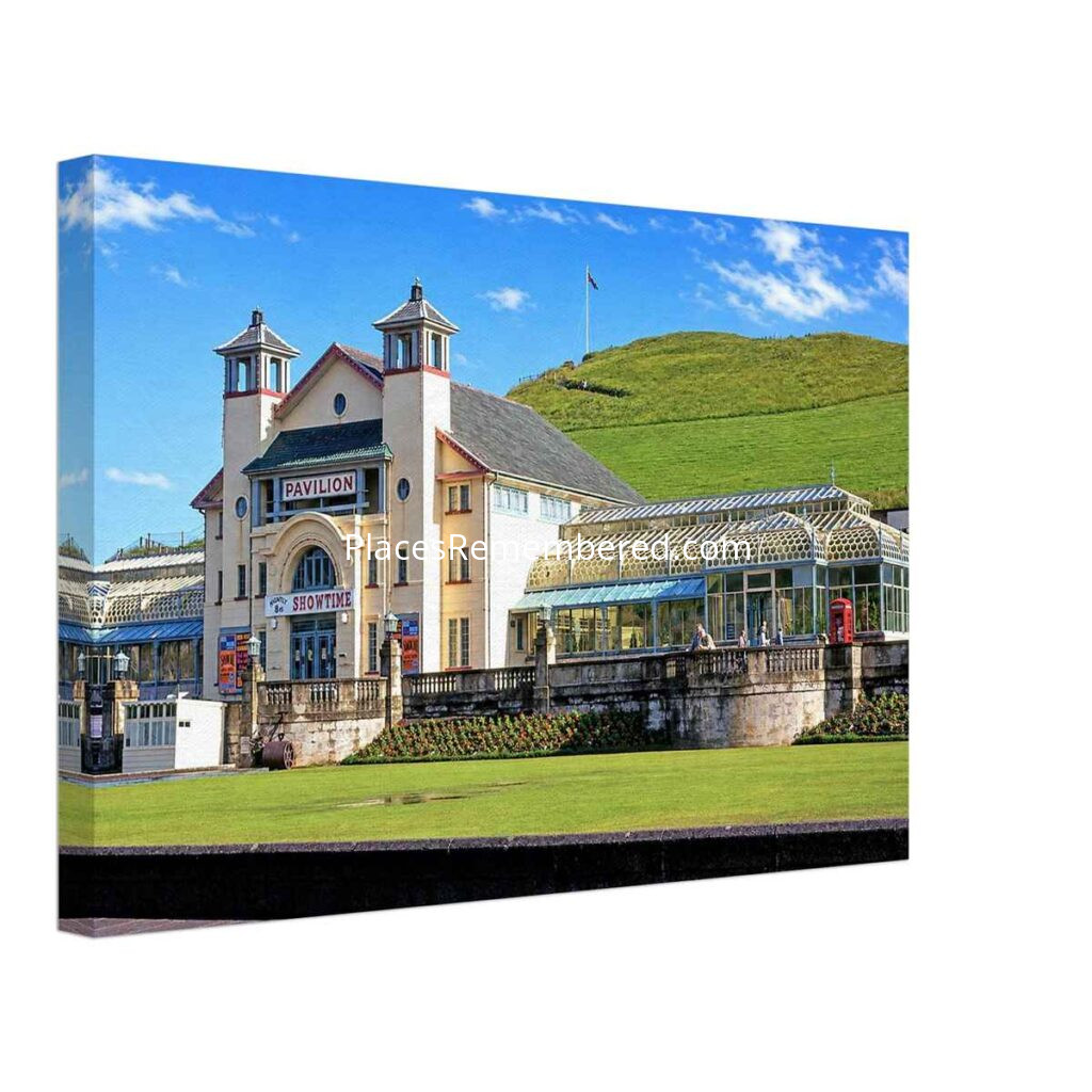 1960s painterly view of the Pavilion Theatre at Ilfracombe, Devon, with Capstone Hill behind, before its demolition - canvas print.